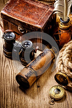 Vintage grunge still life. Antique items on wooden table