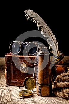 Vintage grunge still life. Antique items on wooden table