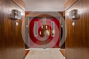 Vintage hallway of hotel decorated with wooden panels