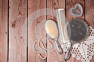 Vintage hand mirror and hairbrush