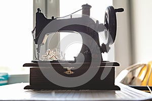 Hand sewing machine closeup