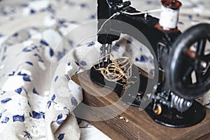 Hand sewing machine closeup