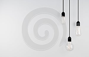 Vintage hanging light bulb on light background. 3d rendering