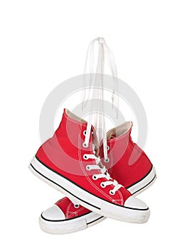 Vintage hanging red shoes tied photo