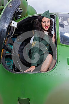 Vintage helicopter and pinup soldier