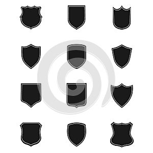 Vintage heraldic shield shapes labels design. Retro style borders, frames, labels set