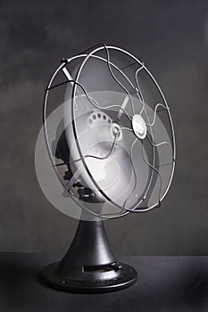 VINTAGE HIGH LOW TECH TECHNOLOGY INNOVATION METAPHOR DRAMATIC ELECTRIC FAN ABSTRACT BACKGROUND