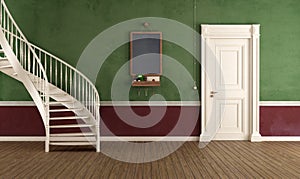 Vintage home entrance with circular staircase