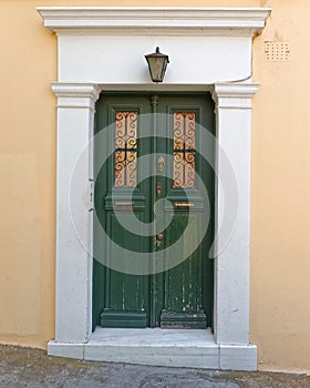 Vintage house green door, Plaka old neighborhood, Athens Greece