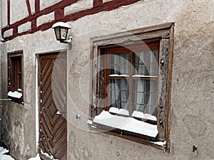 Vintage house wall with wooden window and door
