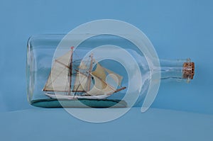 vintage impossible bottle sailing ship with masts and sails