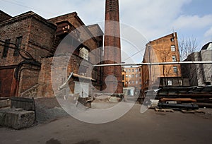 Vintage industrial red brick building in the industrial area of the old European city.