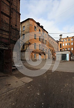 Vintage industrial red brick building in the industrial area of the old European city.