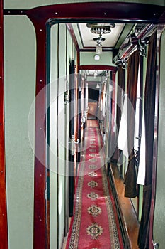 Vintage interior of a luxury  carriage in a retro train. The beginning of the 20th century