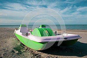 Vintage italian `pedalÃ²`, paddle boat from the Seventies, abandoned in a Riviera Romagnola