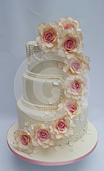Vintage ivory wedding cake with roses
