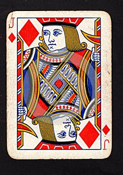 A vintage jack of diamonds playing card on a black background.