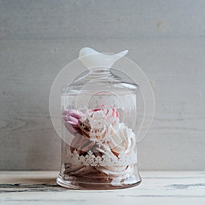 Vintage jar of marshmallow on a gray background