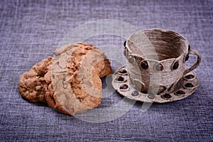 Vintage jar of white flour stands in the middle of a pile of grain o