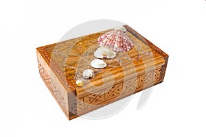 Vintage jewelry box isolated on white background. Wooden chest with seashells decoration on top