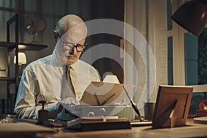 Vintage journalist working in the office