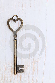 Vintage key heart shape photo
