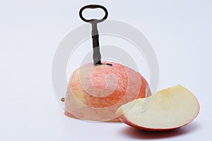 Vintage key inserted in apple