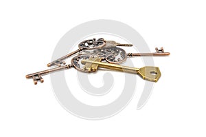 Vintage key on white background close-up. Texture, background, old, macro, wallpaper, metal, brass