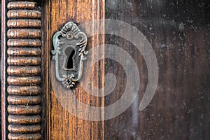 Vintage keyhole of vintage wooden cabinet