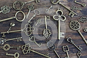 Vintage Keys on Rustic Wooden Background