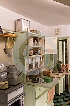 A vintage kitchen from the nineteen sixties with vintage cookware and shopping exactly how it would have looked in the 1960`s