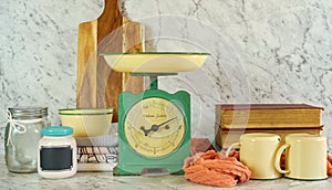 Vintage kitchen scale decor with farmhouse style kitchenware.