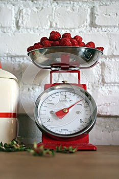 Vintage kitchen-scales with strawberries
