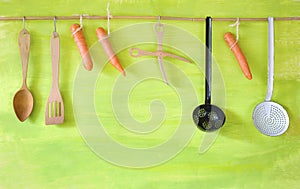 Vintage kitchen utensils and carrots