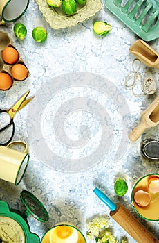 Vintage kitchenware creative layout top view on white textured background.