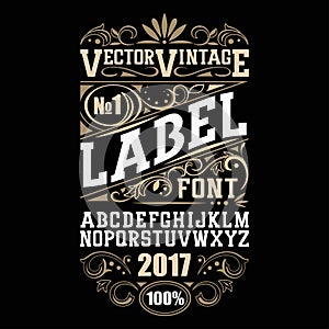 Vintage label font. Whiskey label style with vintage ornament