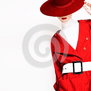 Vintage lady fashionable style in a red cloak and hat