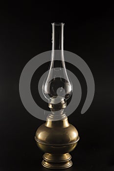 vintage lamp with glass lampshade photographed on a black background