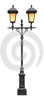 Vintage lamp post with light on, isolated on a white background