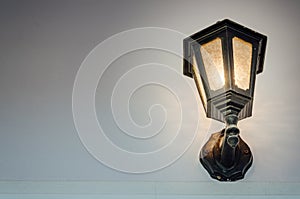 Vintage lamp on wall