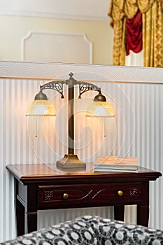 Vintage lamp on the wooden table