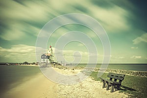 Vintage Landscape with Lighthouse on Bank