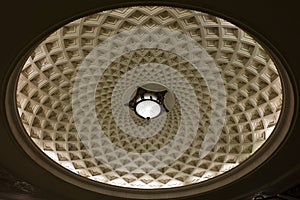 Vintage lantern in the caisson on the ceiling of Kievskaya underground station in Moscow.