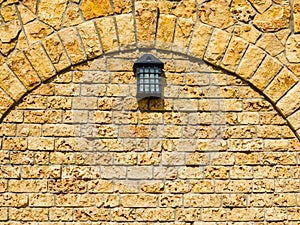 Vintage lantern on an old wall