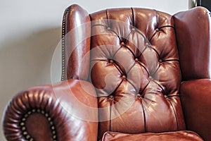 Vintage leather armchair in red brown