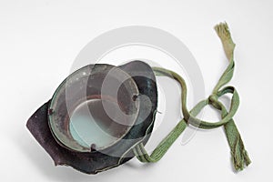 Vintage leather safety glasses with ropes for tying at back of the head. with clipping path