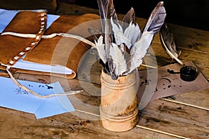 Vintage letter writing set. Feathers and ink for writing in retro style