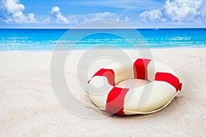 Vintage Life buoy on the sand at the beach