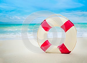 Vintage Life buoy on the sand at the beach