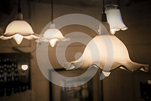 The vintage light bulb hanging decoration . The vintage hanging electric lamps. light in the dark hope concept idea. vintage